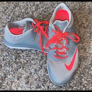 Grey and pink nike sneakers.